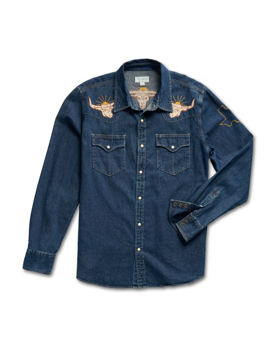 Dark denim long-sleeve shirt with a button-up front and embroidered deer and cow skull designs on the shoulders.