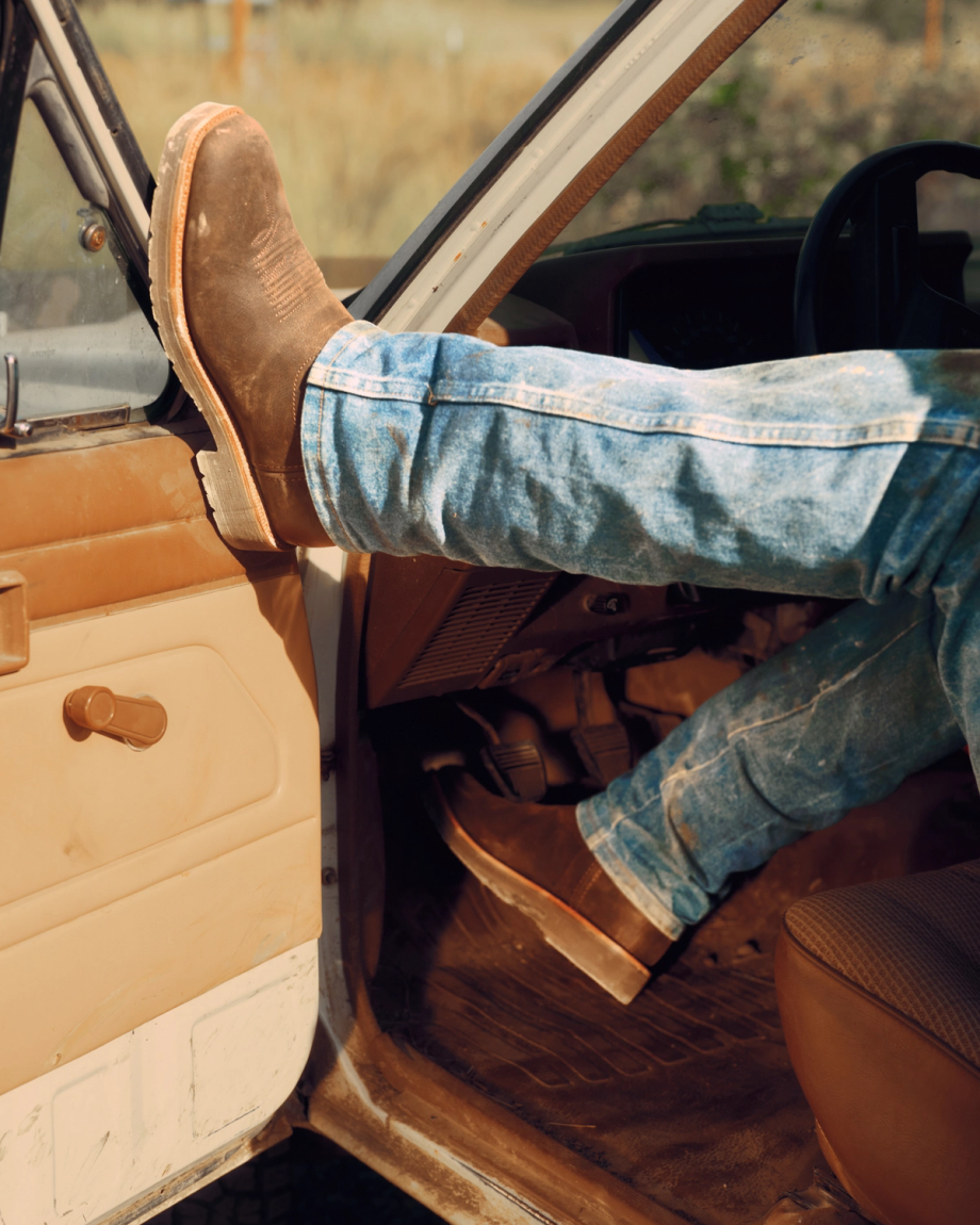 Toe view of Tecovas x Mossy Oak Rugged Square Toe - Umber II Cowhide on plain background