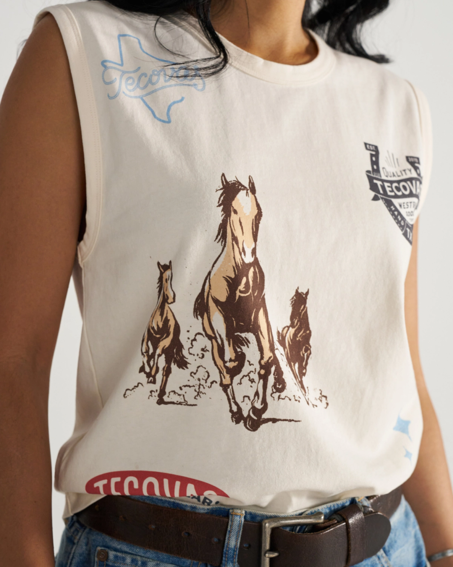 Front view of Women's Muscle Tank - Bone on model