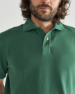 Closeup detail view of Men's Polo Short Sleeve Pearl Snap - Hunter Green