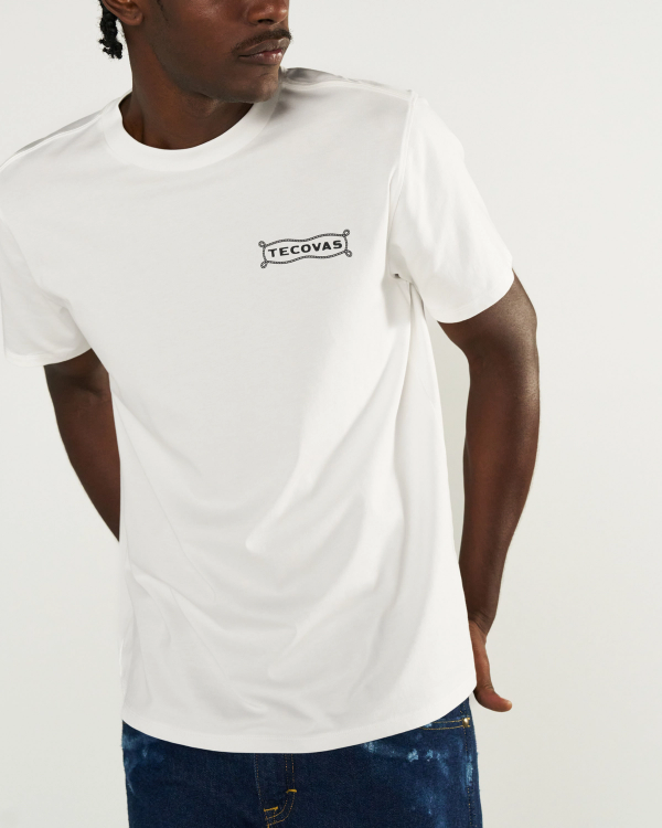 Front view of Men's Boot Expo T-Shirt - Bone on model