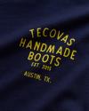 Closeup view of Men's Tecovas Handmade Boots Tee - Navy/Yellow
