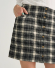 Closeup view of Women's Plaid Mini Skirt - Black / White