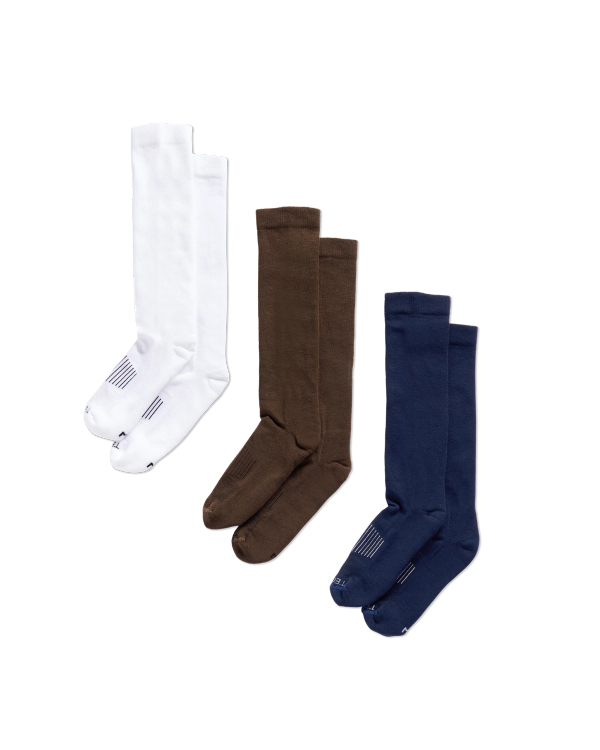 Quarterfront view of Boot Socks - Navy / Brown / White on plain background