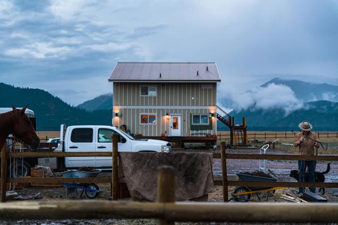 a ranch house and a fence