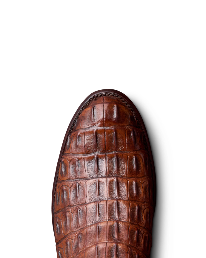 Toe view of Men's Birthday Boot IX - Dark Cognac / Bone on plain background