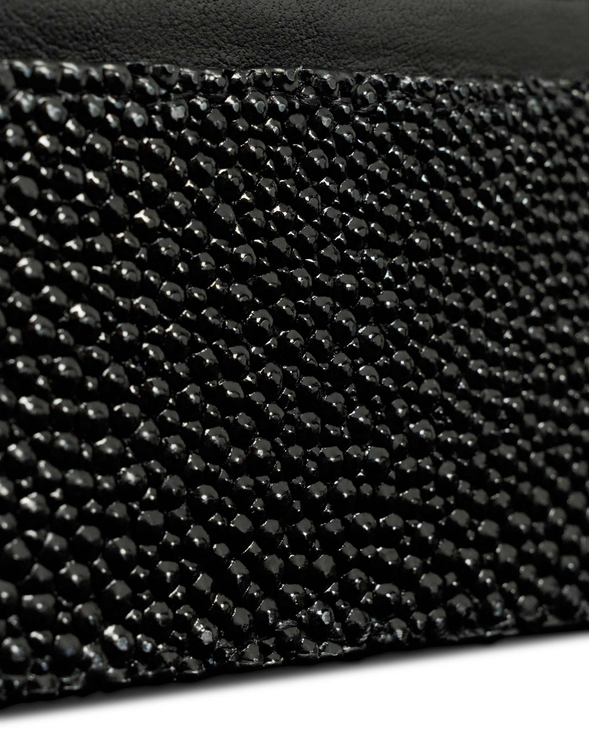 Closeup view of Men's Stingray Card Case - Jet Black