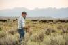 man standing in a field