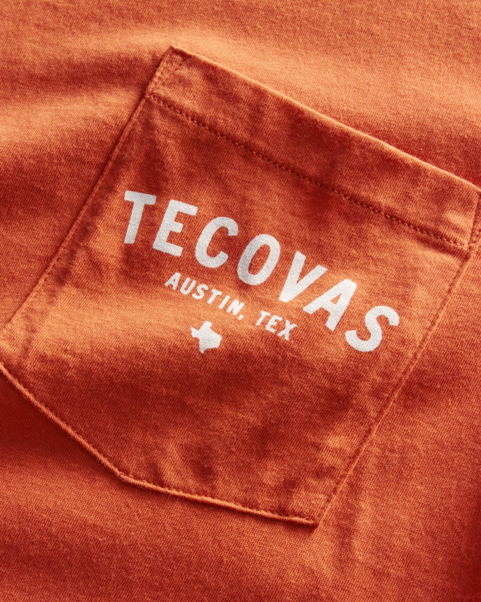 Flatlay image of the orange rust tecovas t shirt on a plain background