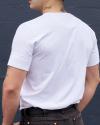 Back view of man wearing the henley in white