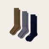 Three pairs of boot socks in varying colors