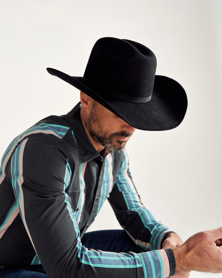Front view of Cattleman Fur Cowboy Hat - Black on model