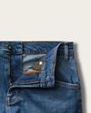 close up of premium standard jeans in medium blue wash
