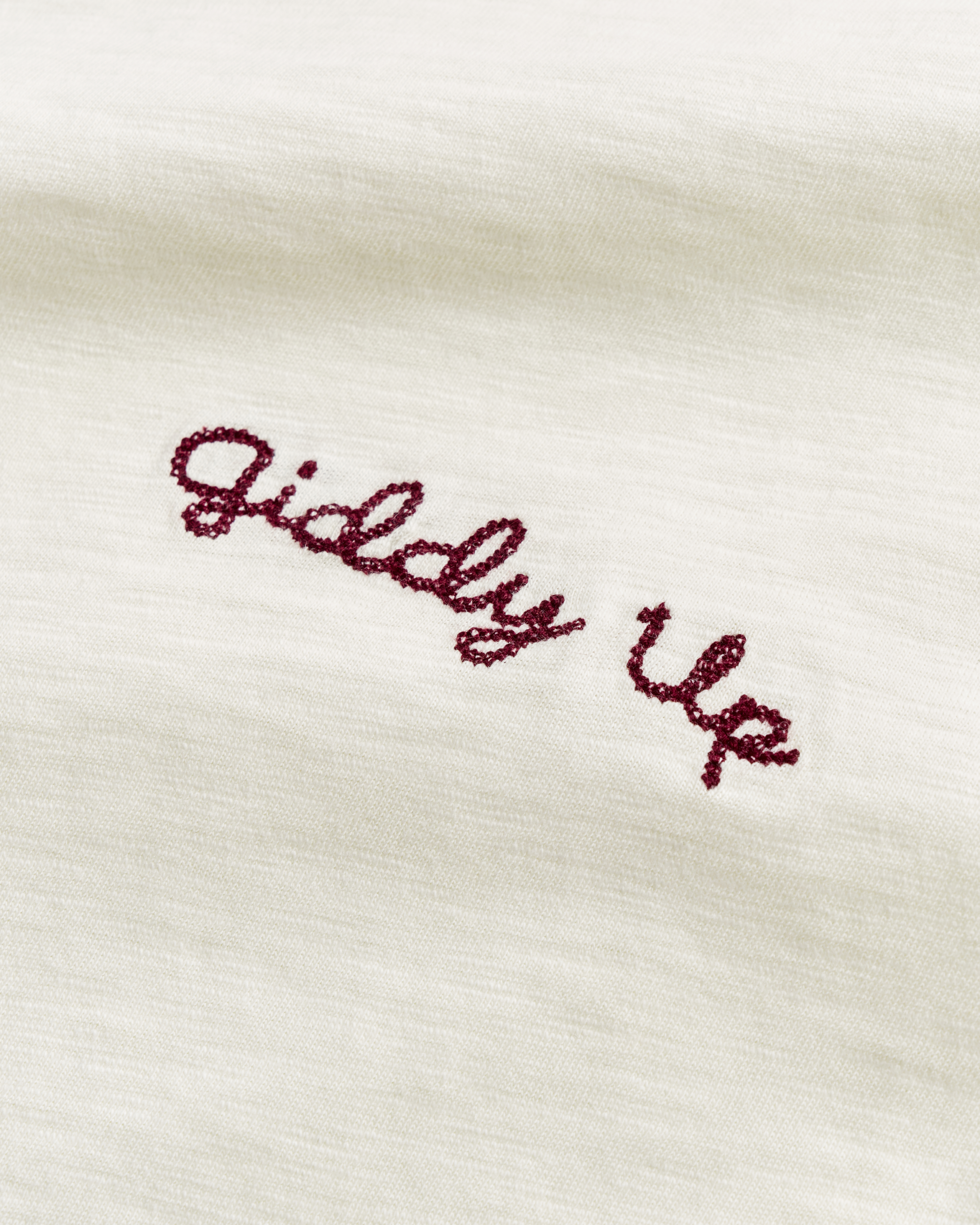 Closeup view of Women's Vintage Ringer Tee - Bone / Burgundy