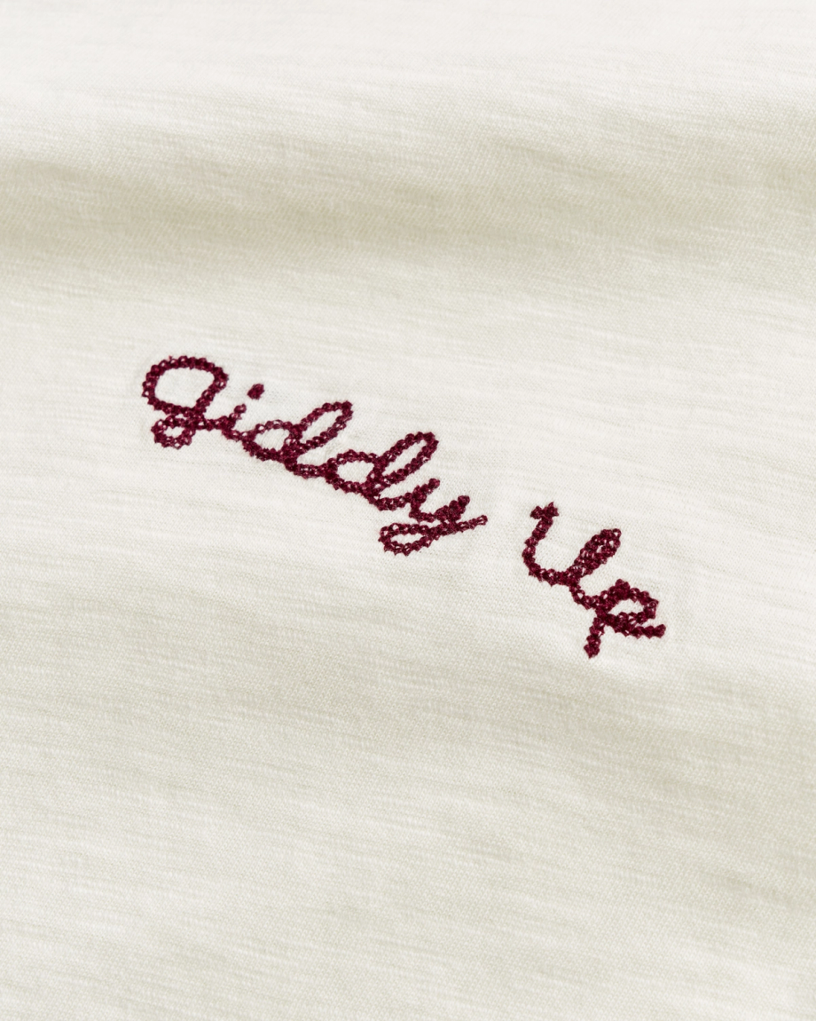 Closeup view of Women's Vintage Ringer Tee - Bone / Burgundy