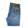 Back view of Women's High-Rise Tapered Jean - Light on plain background