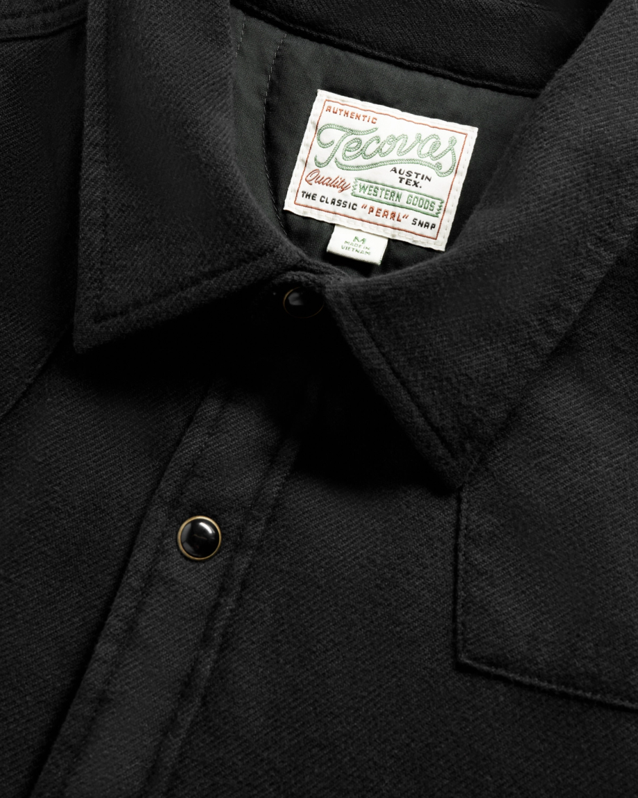Closeup detail view of Men's Sawtooth Pearl Snap Shacket - Black