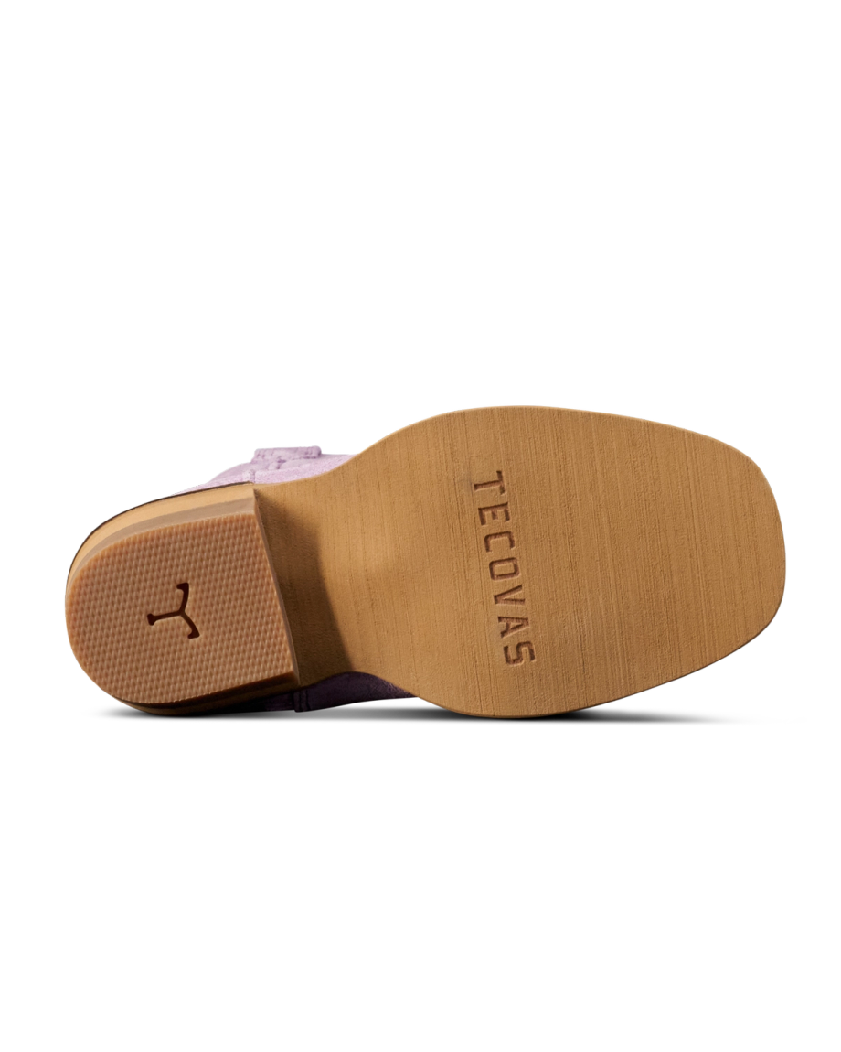 The sole of a boot with "Tecovas" stamped on the bottom; heel features a horseshoe-shaped detail.