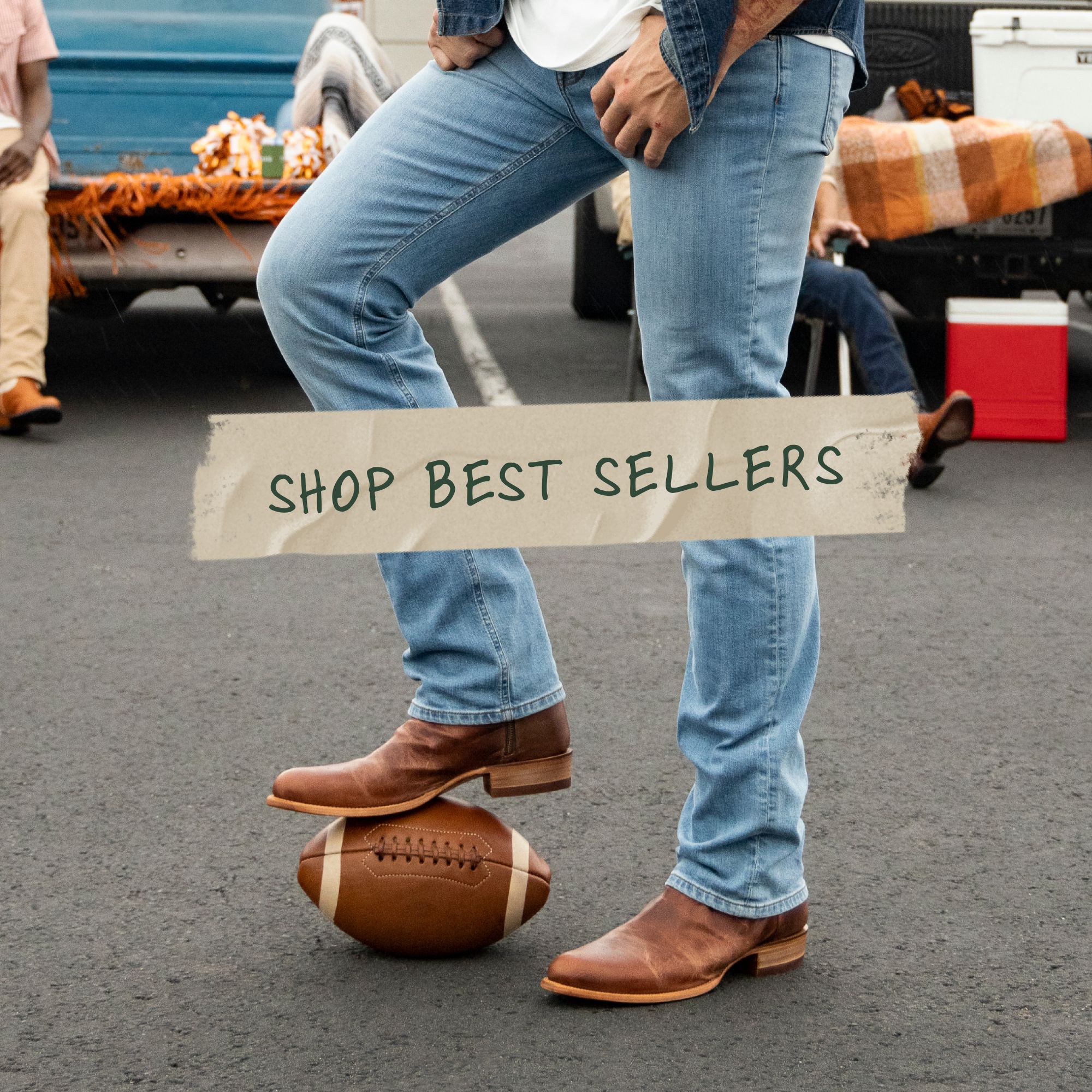 A person wearing jeans and brown boots stands with a foot on a football next to a tailgate area. Text overlay reads "Shop Best Sellers.