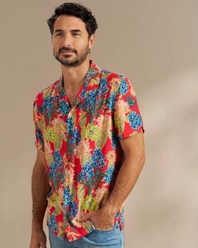 Man wearing the lakeside shirt in a photo studio