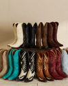 Photo of all the Annie boots in a studio 