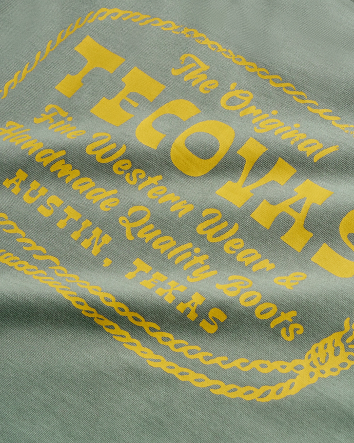 Closeup view of Men's Original Tecovas Rope Tee - Cactus / Yellow