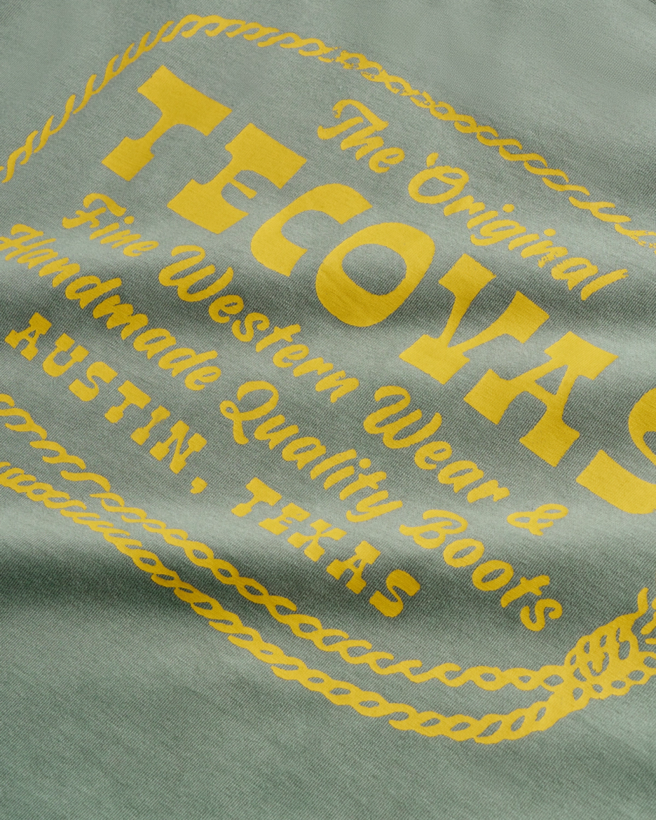 Closeup view of Men's Original Tecovas Rope Tee - Cactus / Yellow