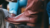Image of roper boot at a shoe shine station