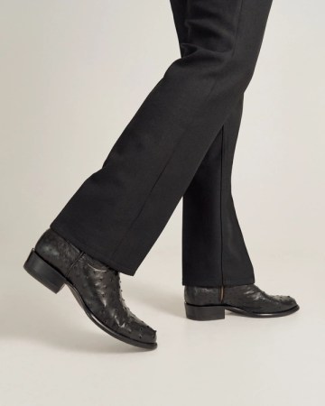 close up of Dean Midnight Black Zip Cowboy Boot on a man's feet 