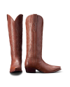 Pair of brown cowboy boots with decorative stitching, standing upright.