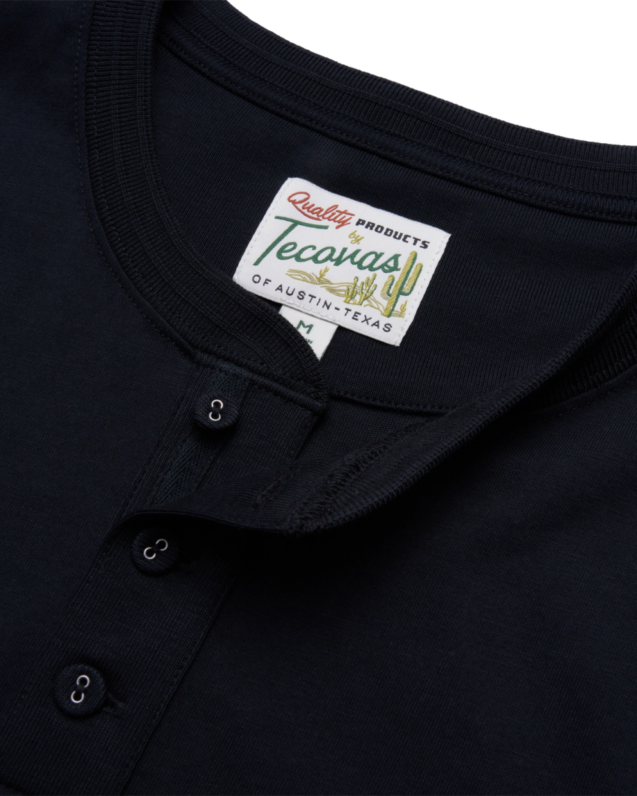 closeup of the men's black short sleeve henley