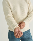 Front view of Men's Crew Neck Desert Sweater - Whisper White on model
