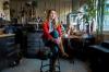 woman on a stool in a work room
