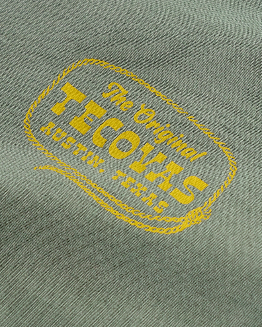 Closeup detail view of Men's Original Tecovas Rope Tee - Cactus / Yellow