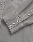Closeup detail view of Men's Denim Pearl Snap - Light Gray
