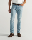 Front view of Men's Slim Stretch Denim - Light Stone Wash on model