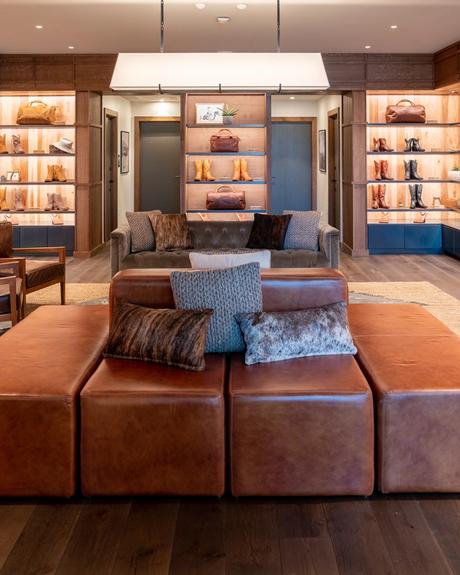 Image of the inside of the Main Street Tecovas Store walls of boots