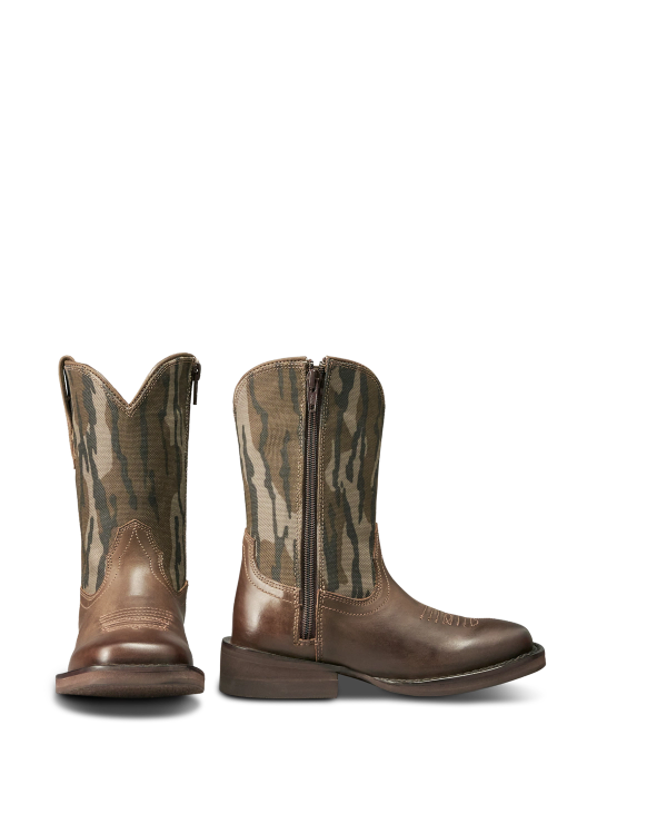 Pair of brown leather cowboy boots with camouflage-patterned fabric shafts and side zippers, displayed against a plain white background.