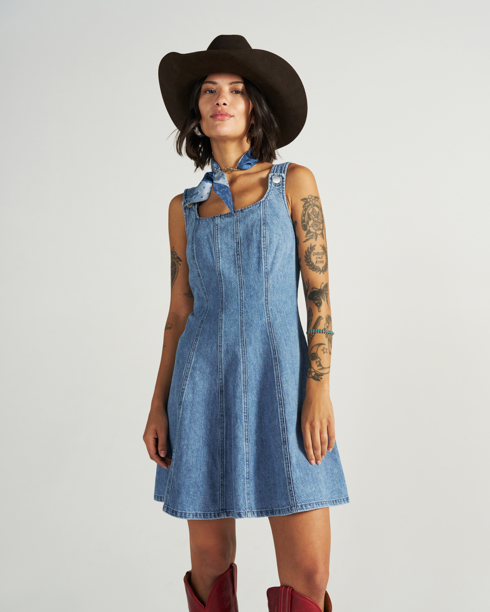Front view of Women's Structured Mini Dress - Medium Wash on model