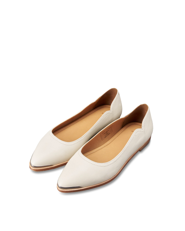 Quarterfront view of The Misty - Bone Cowhide on plain background