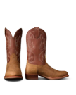 The Buck in Copper Cowhide. Pair of brown western cowboy boots, named The Buck Cowhide, with a light brown foot and darker brown shaft featuring decorative stitching, shown from the front and side on a white background.