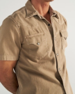 Closeup detail view of Men's Denim Short Sleeve Pearl Snap - Coriander