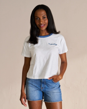 Woman wearing the Women's Vintage Ringer Tee and denim shorts in a photo studio