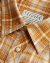 Closeup detail view of Men's Cotton Pearl Snap - Brown Multi Plaid