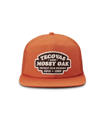 Front view of Tecovas x Mossy Oak Flat Brim Trucker - Rust on plain background