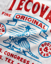 Closeup view of Men's Armadillo Cowboy Tee - Bone/Orange/Blue