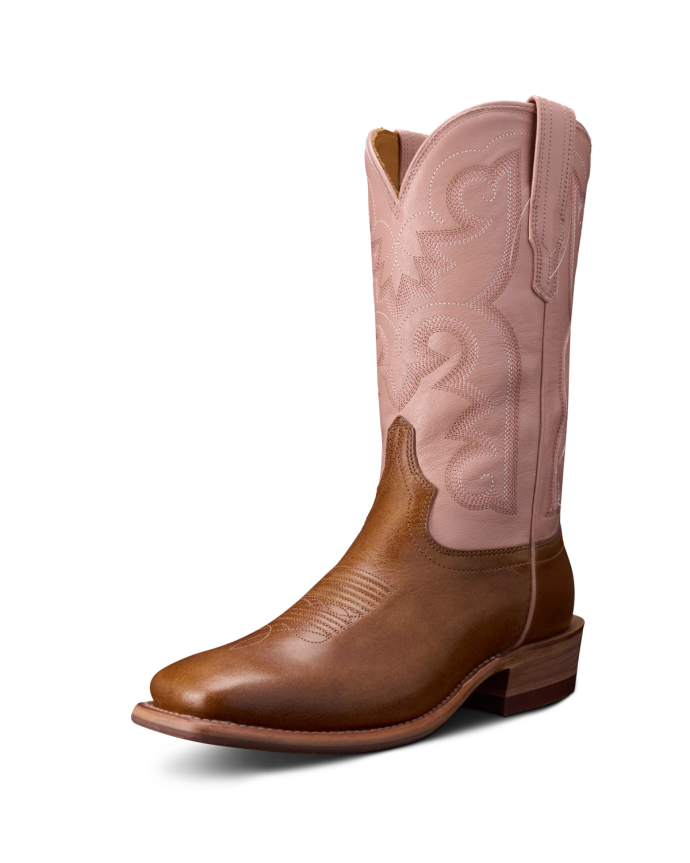 A single cowboy boot with a brown leather foot and a pink embroidered shaft on a white background.