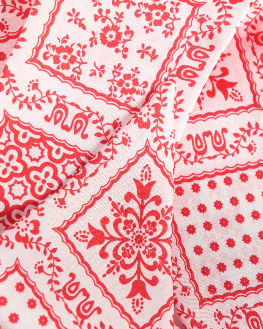 Closeup view of Bandana Ribbon Scarf - Red / Cream