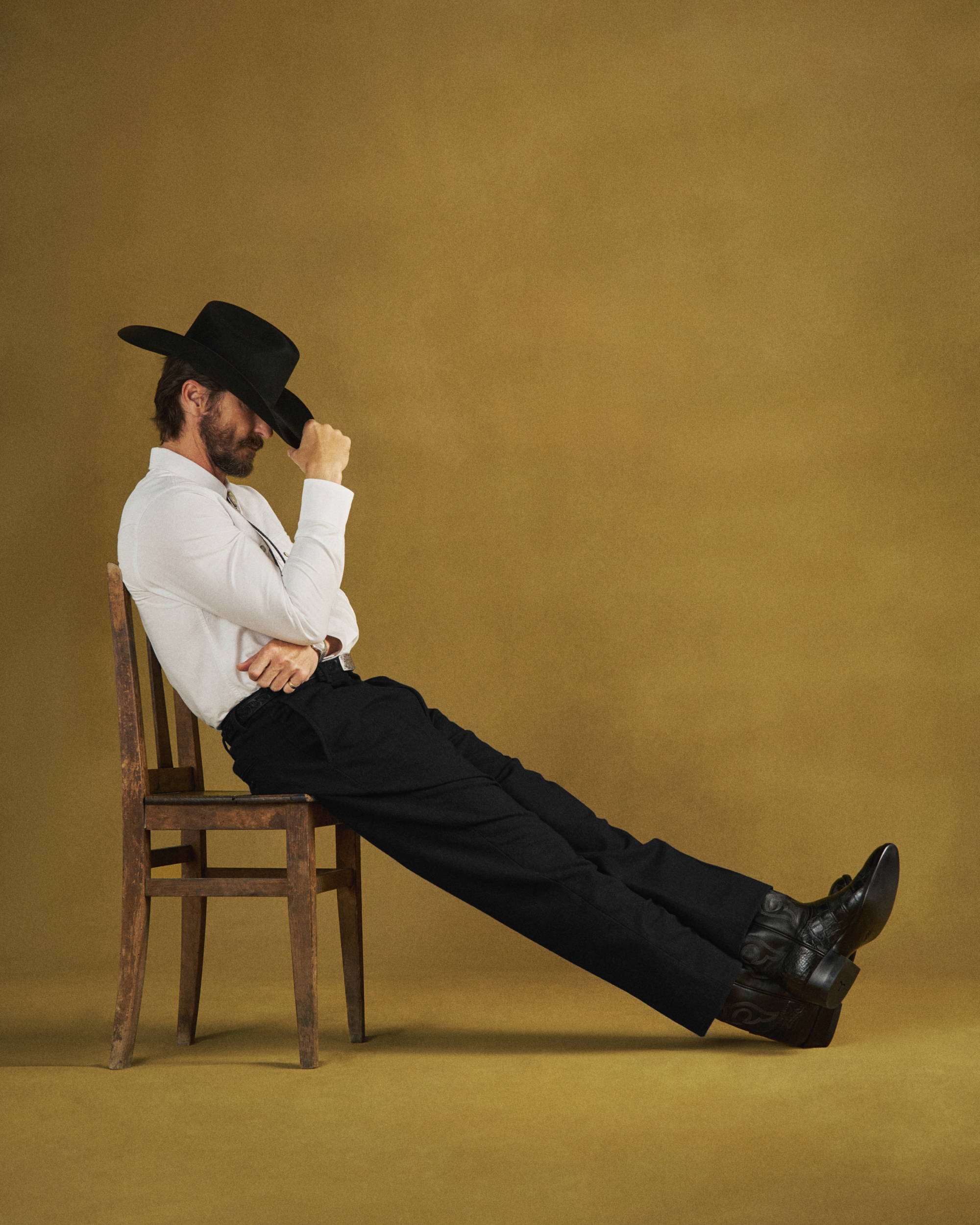 Full view of The Stallion x Tecovas Boot - Midnight Giant Gator on model