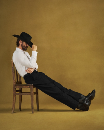 Full view of The Stallion x Tecovas Boot - Midnight Giant Gator on model